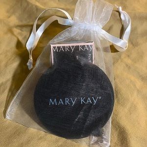 Mary Kay gel eyeliner/brush and mirror in gift bag.